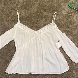 White flowy top